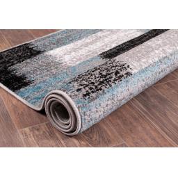 Spirit Mosaic Teal rolled.jpg