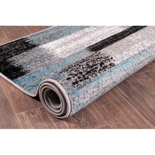 Spirit Mosaic Teal rolled.jpg