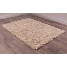 IND035-Modern-Shaggy-Style-Indulgence-Plain-Latte-Polyester-Rug-80-x-150.jpg