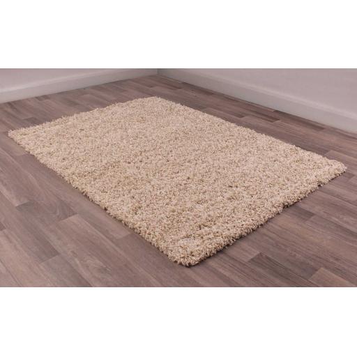 IND035-Modern-Shaggy-Style-Indulgence-Plain-Latte-Polyester-Rug-80-x-150.jpg