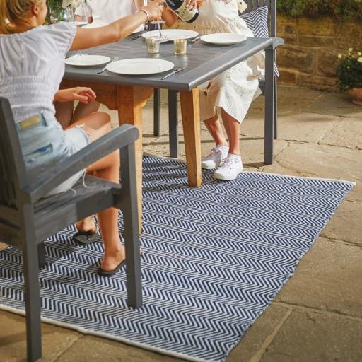 Hug Rug Woven Washable Reversible Herringbone Outdoor Indoor Rug in Navy Blue