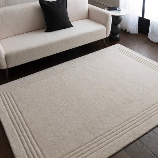 Orlo Natural Wool Plain Framed Bordered Ivory Rug